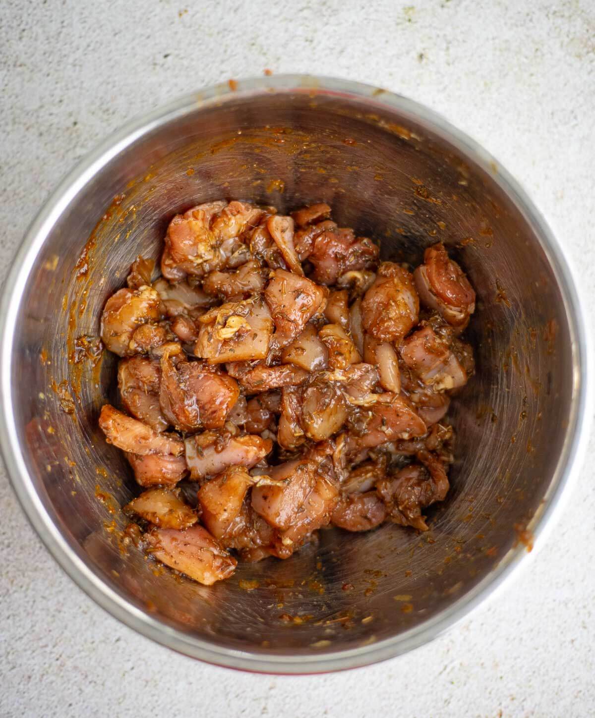 Chicken seasoned with green seasoning and cassareep for chow mein