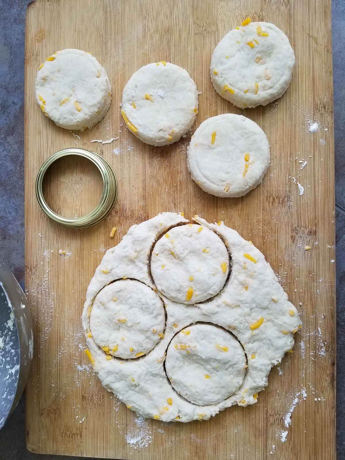 Rounds of coconut bake biscuit dough cut and ready for baking