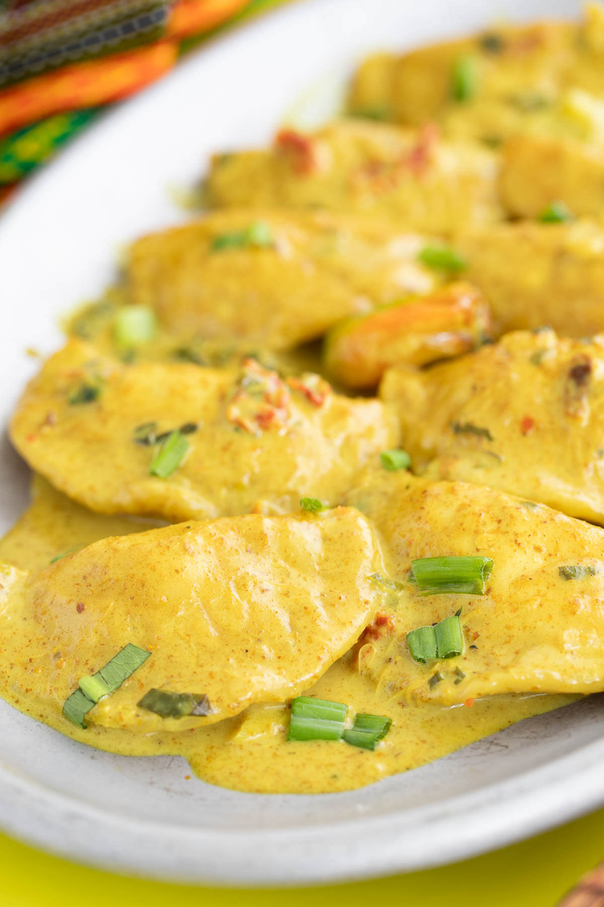 A upscale twist to the traditional dish, curry crab stuffed dumplings is the elevation you need. Dumplings stuffed with crab in a coconut curry sauce. Closeup of curry crab dumplings in a coconut curry sauce.