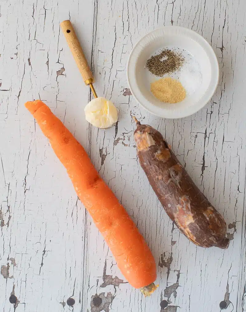 Ingredients for butter cassava with cassava, carrots, butter, onion, and seasonings
