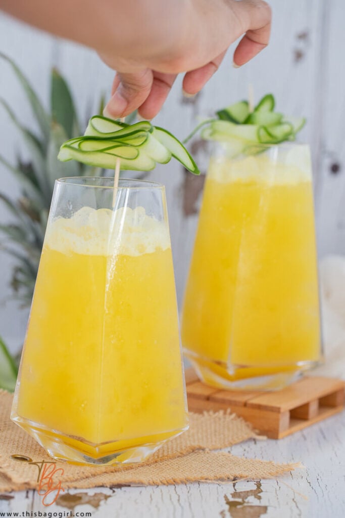 Glasses filled with refreshing pineapple ginger juice.