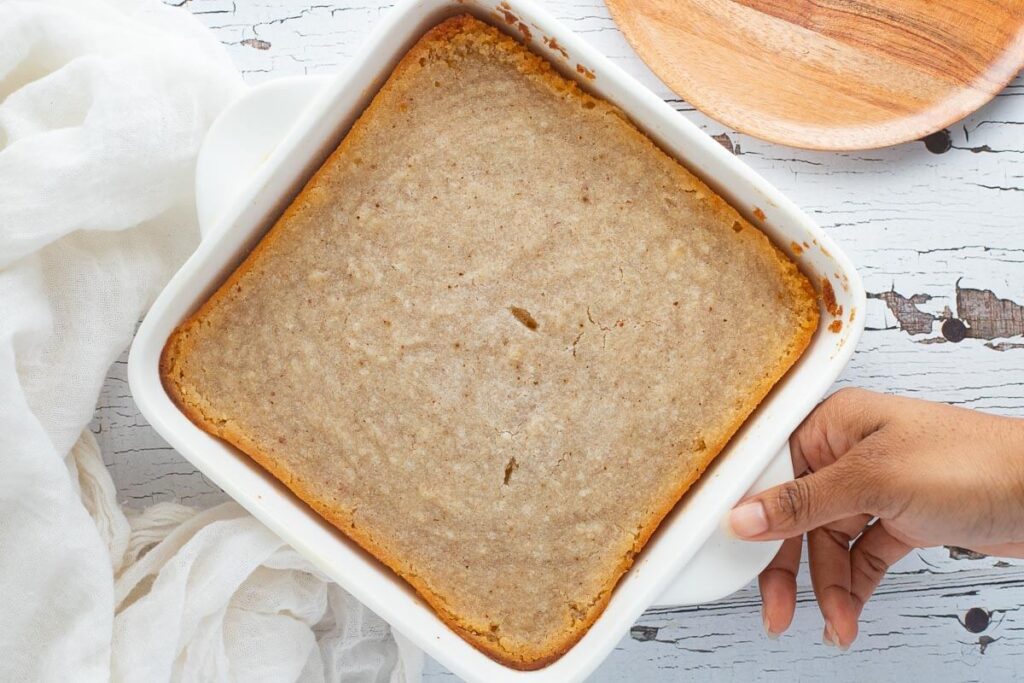 Cassava pone fresh out the oven with crispy, golden-brown edges.