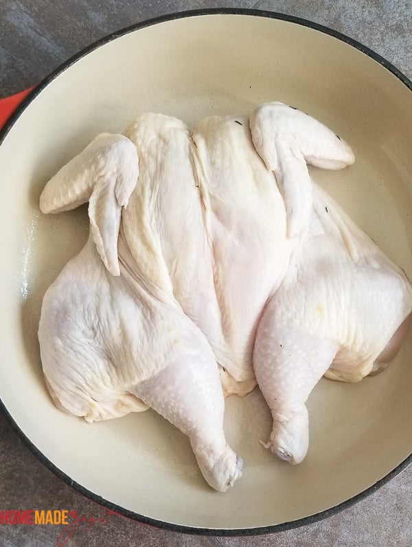 Picture of the chicken already spatchcocked after sitting in the brine