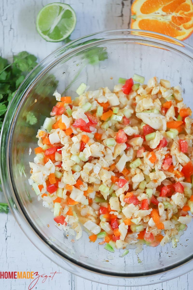 Added citrus juices and conch with vegetables
