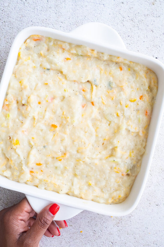 Mashed potato mixture in a white square dish.