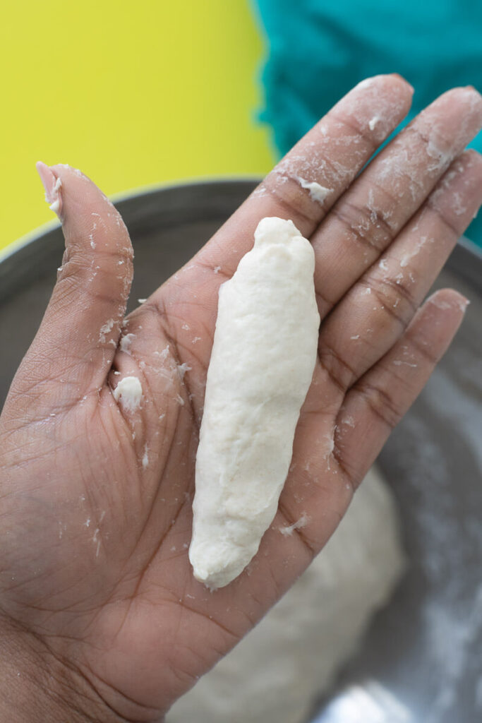 Making dumplings as spinners or logs which we use to put into soups.