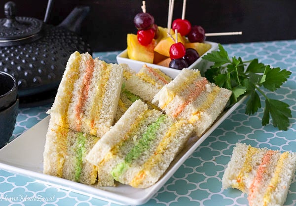 Cheese paste sandwiches stacked ready for eating.