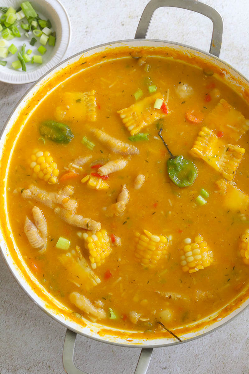 An image of the finished dutch pot of chicken foot soup.