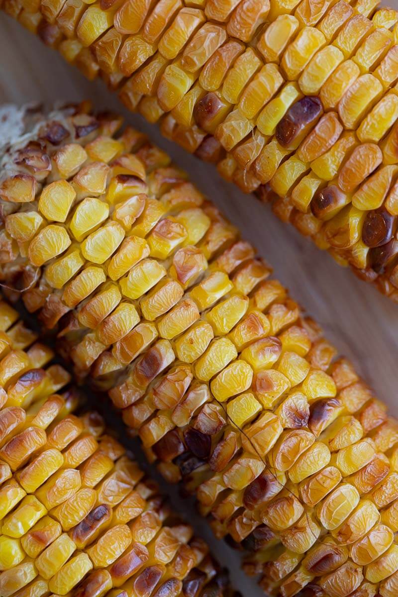 Close up of corn kernels showing the roasted edges.