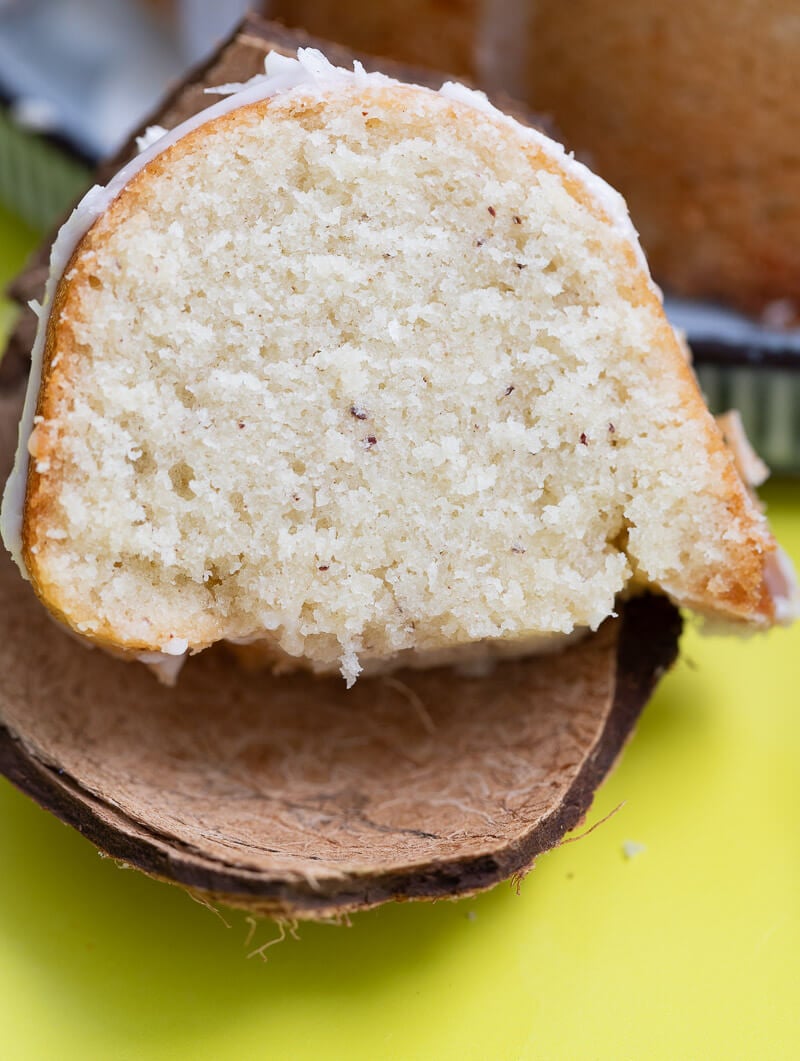 One slice of cake on a chip of coconut shell.