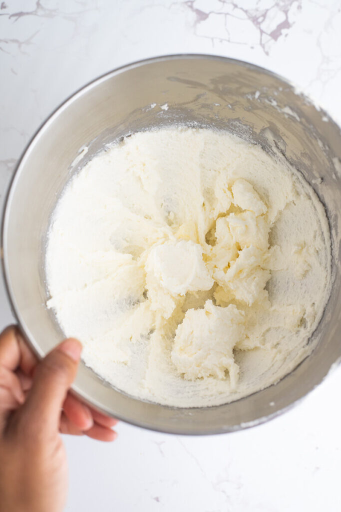 Creamed butter in a silver bowl.