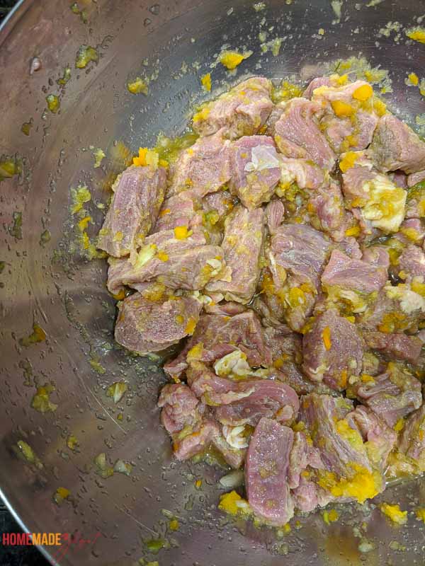A bowl of uncooked but seasoned beef