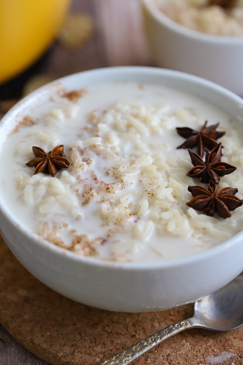 A close up of a bowl of rice porridge showing the grains.