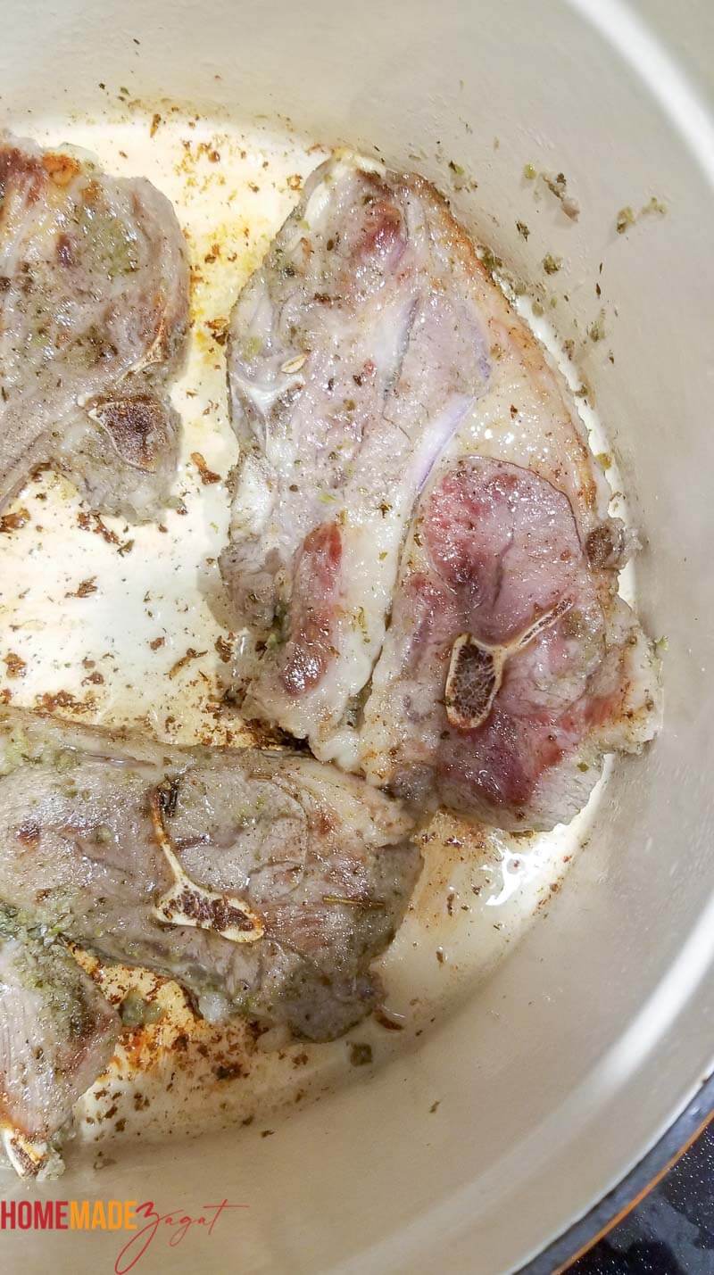 Lamb loins in the process of being browned in the potb loins