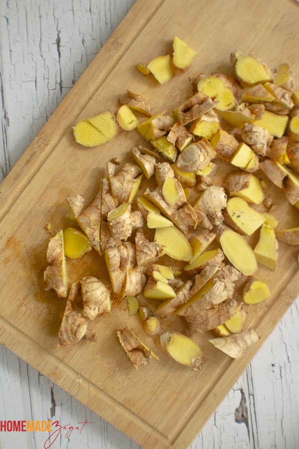 Chopped up ginger on a chopping board
