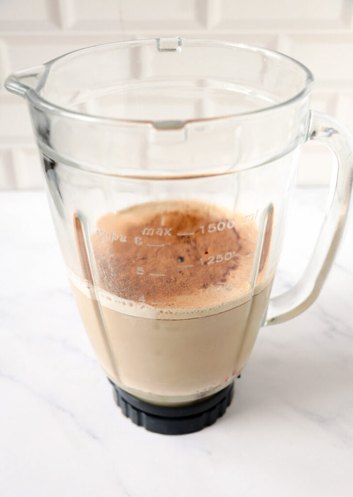 All ingredients placed in the blender base and mixed.