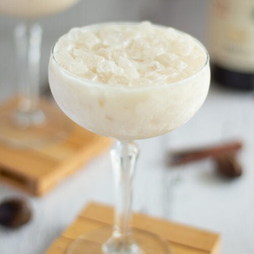 Creamy glass of cremas filled with ice and ready to serve.