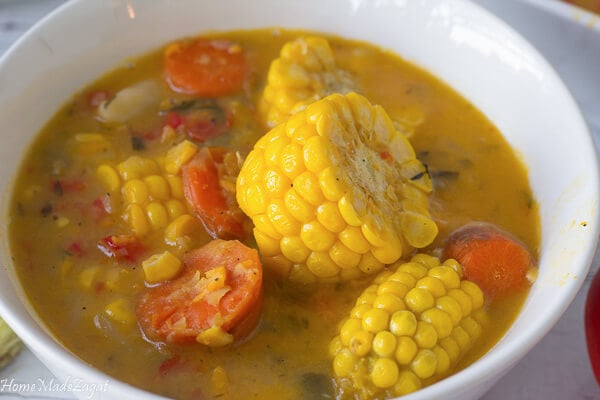 Chunks of fresh corn in a split peas base with carrots and dumplings.