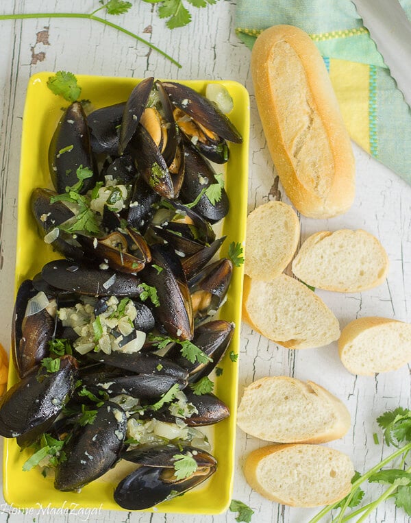 Mussels steamed in milk with pearl onions, shallots and garlic