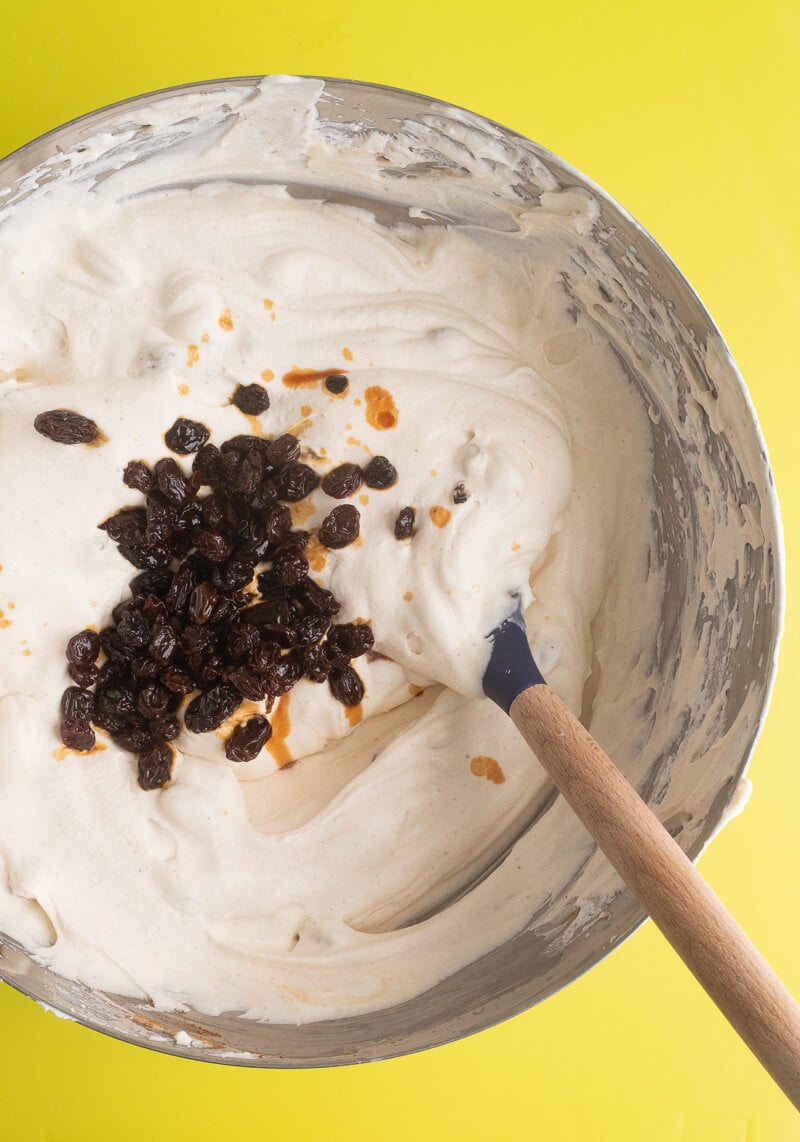 Rum soaked raisins adding into the ice cream base.
