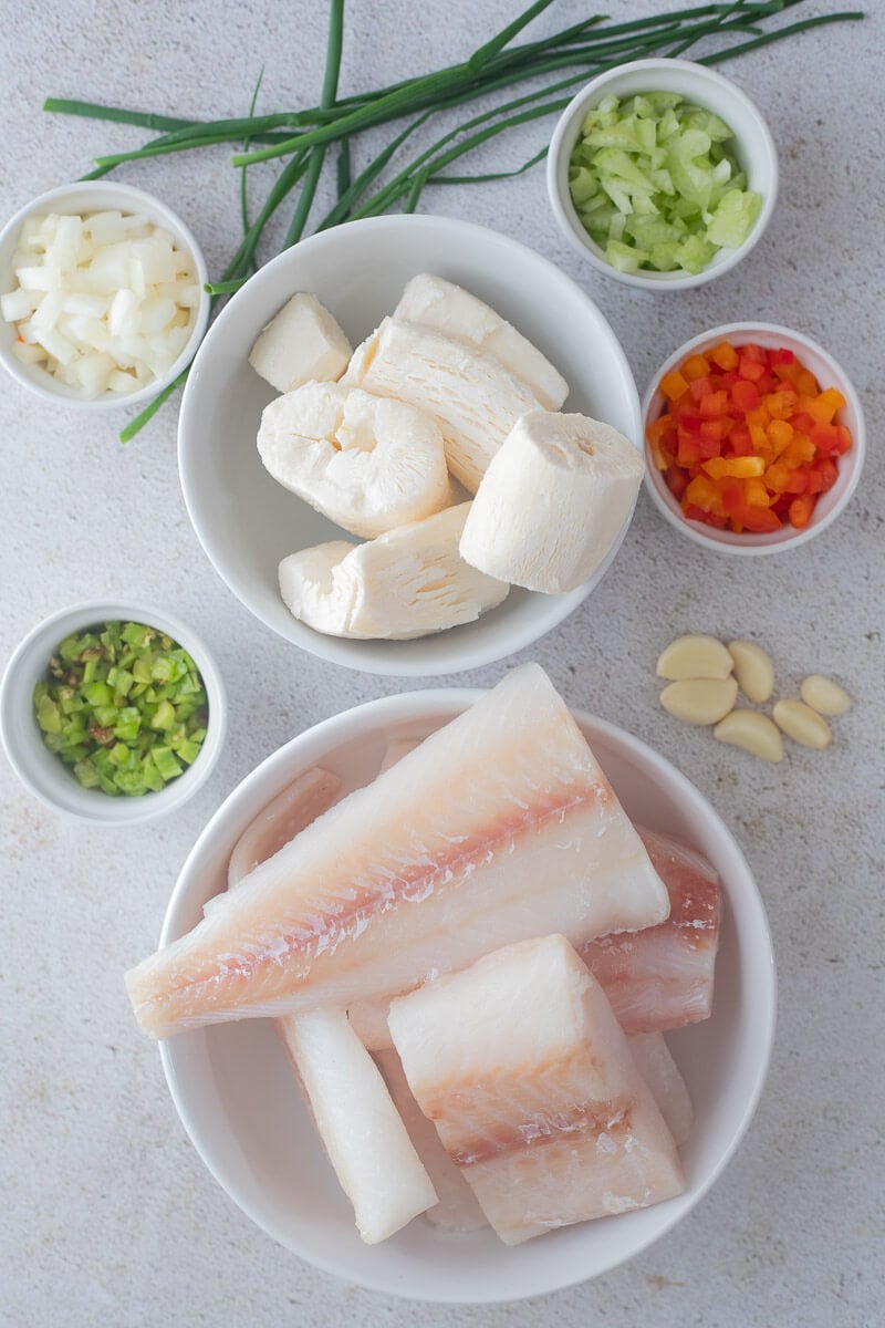 Ingredients needed to make Cassava and pie fish laid out.