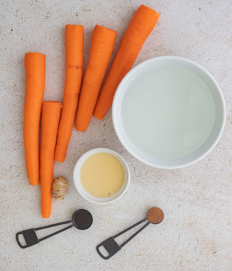 A picture of the ingredients to make Jamaican Carroty juice