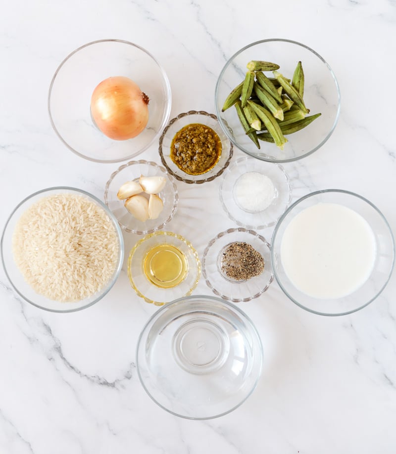 Ingredients needed to make ochro rice portioned out into little bowls.