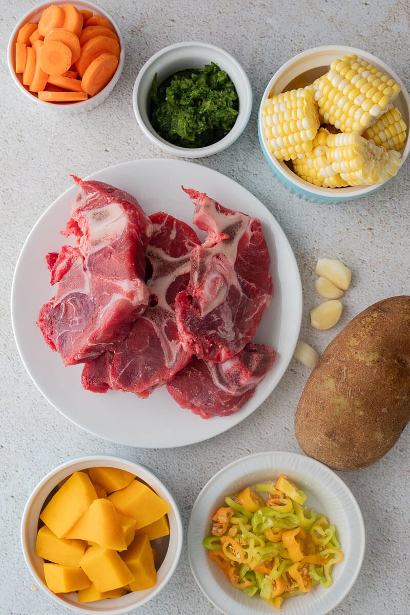 Ingredients needed to make Trini beef soup.