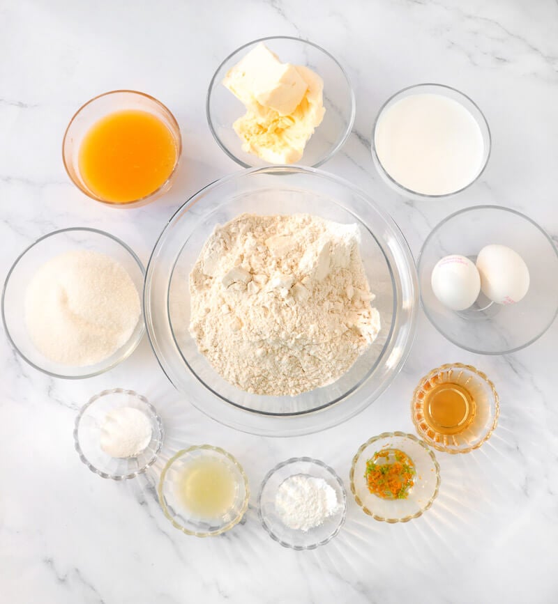 Ingredients needed to make a rum soaked orange rum cake.