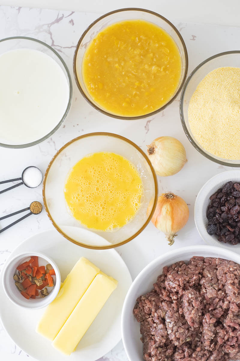The ingredients for baked pastelle pie divvied out in their quantities..