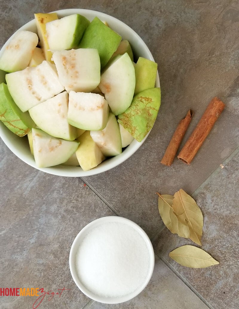 Ingredients for guava juice: fresh guavas, sugar bay leaf and cinnamon
