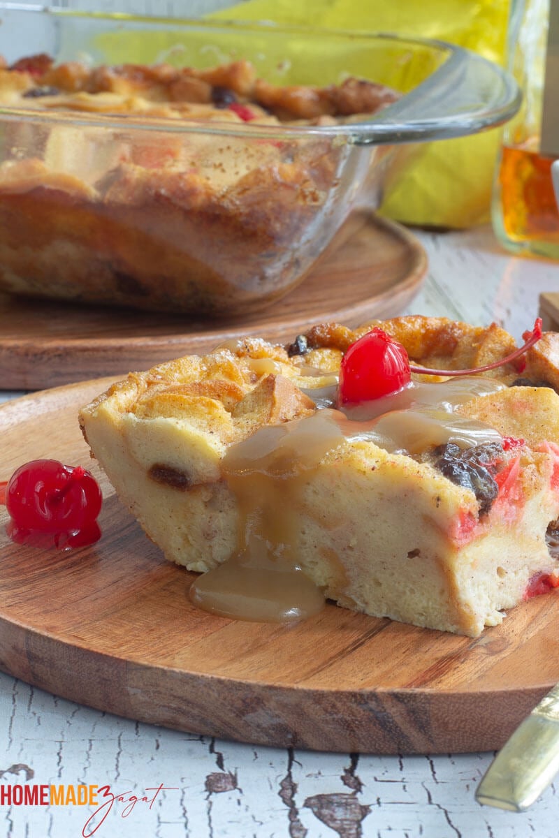 Close up slice of Jamaican bread pudding with Amaretto rum sauce