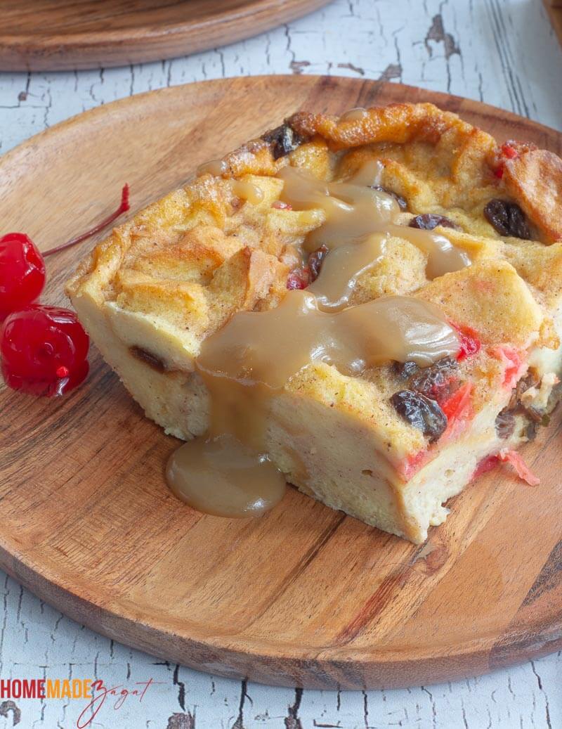 A slice of bread pudding with Amaretto rum sauce