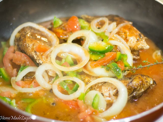 Brown Stew Fish - A quintessential Jamaican dish of fried fish then simmered in a sweet and tangy sauce. #HomeMadeZagat