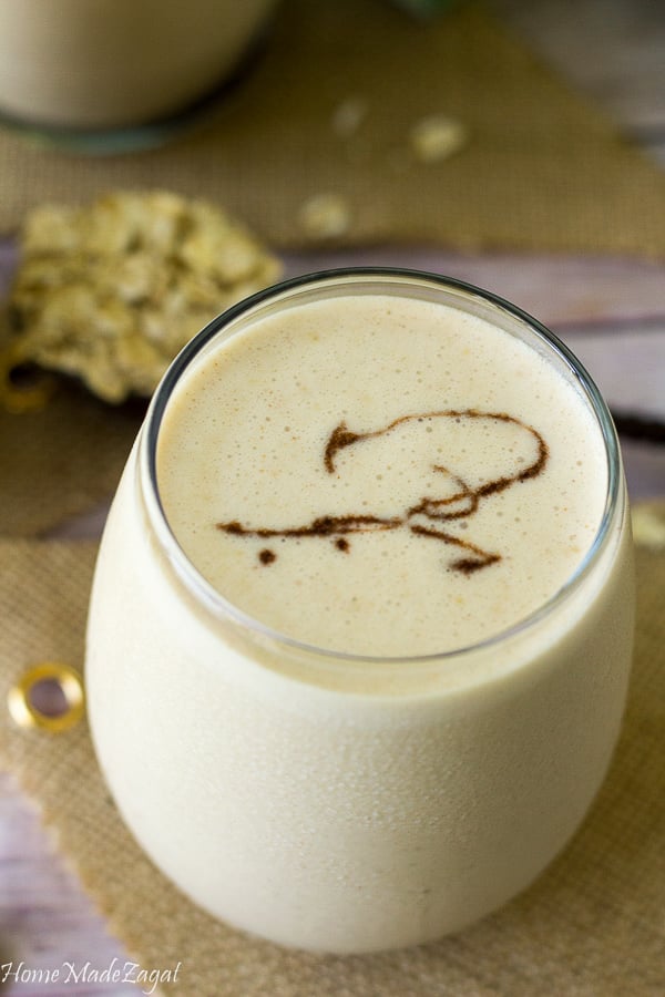 A chilled glass of smooth and creamy peanut punch ready to be served.