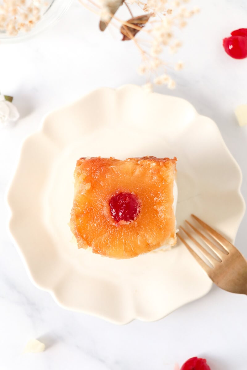 Overhead shot of a slice of pineapple upside down cake.