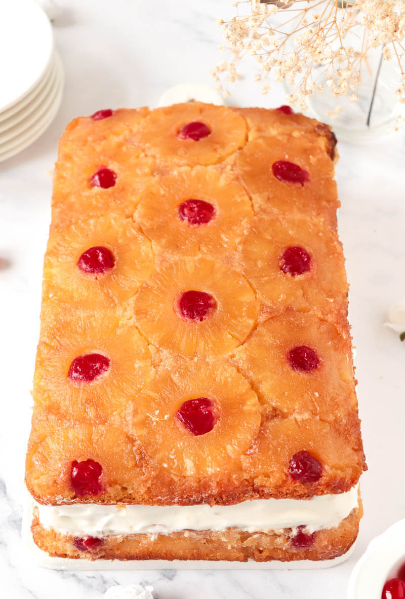 The two cakes layered with whipped creme in the center.