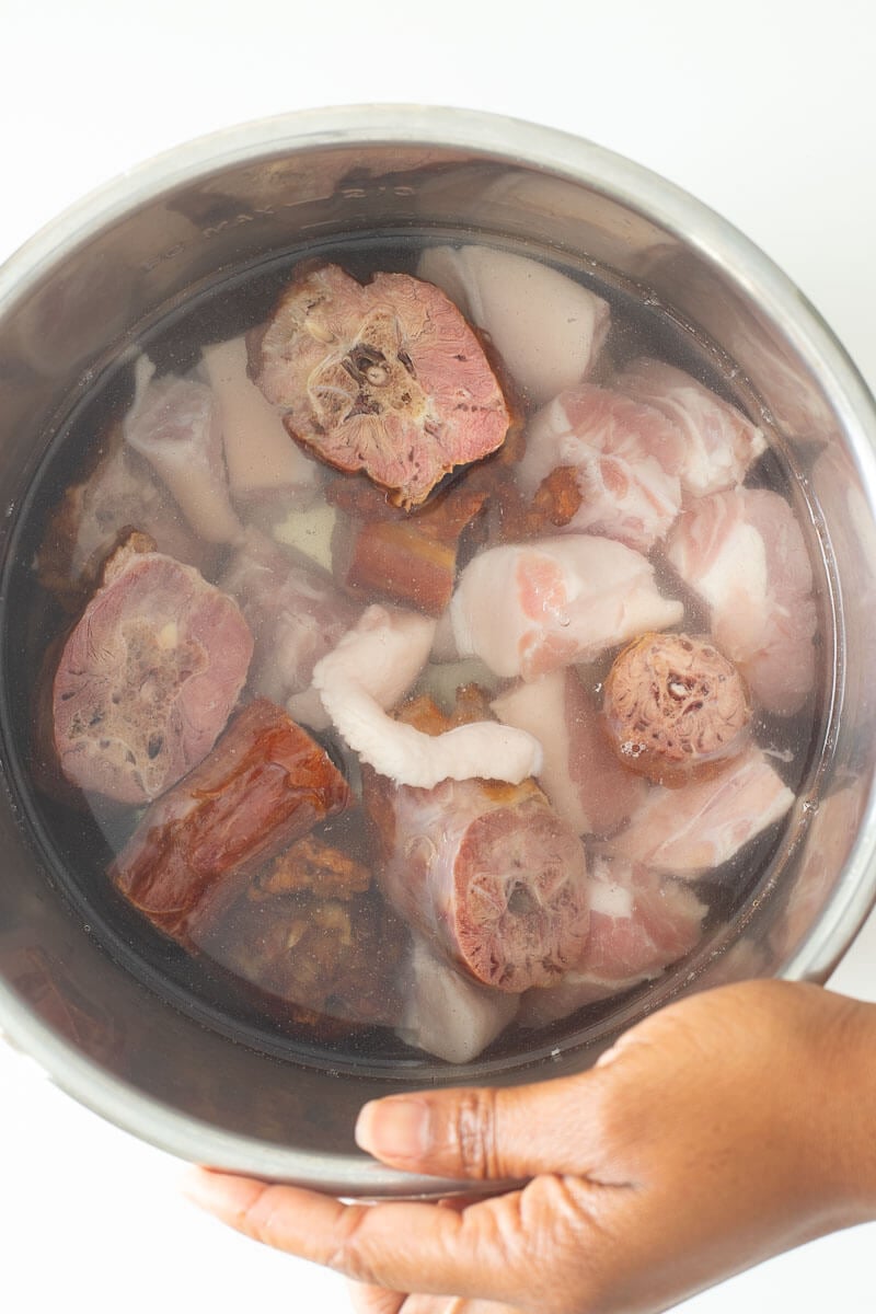 Salted meat for oil down being put to pressure and de salt.