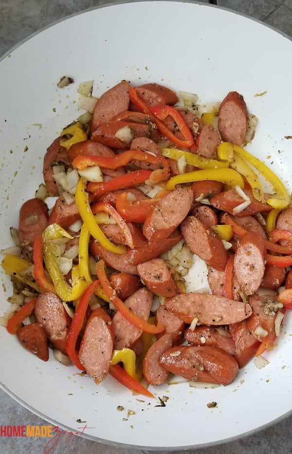 Sausage mixed up with bell peppers, jerk seasoning and onions.