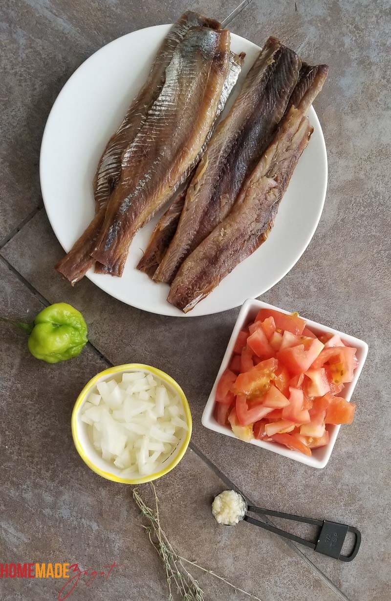 Ingredients of herring, pepper, tomatoes, onions and garlic