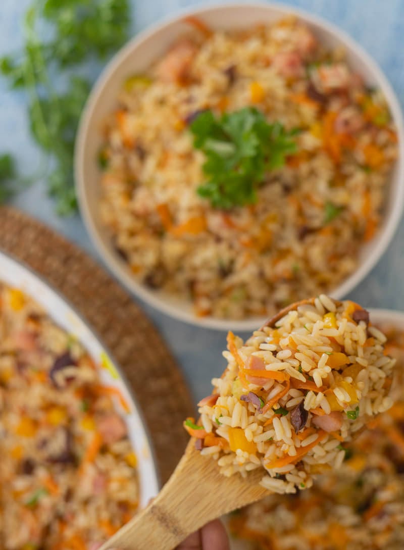 A close shot of a spoonful of Christmas rice.