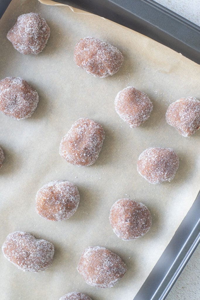 Trinidad tamarind balls coated in sugar on a tray