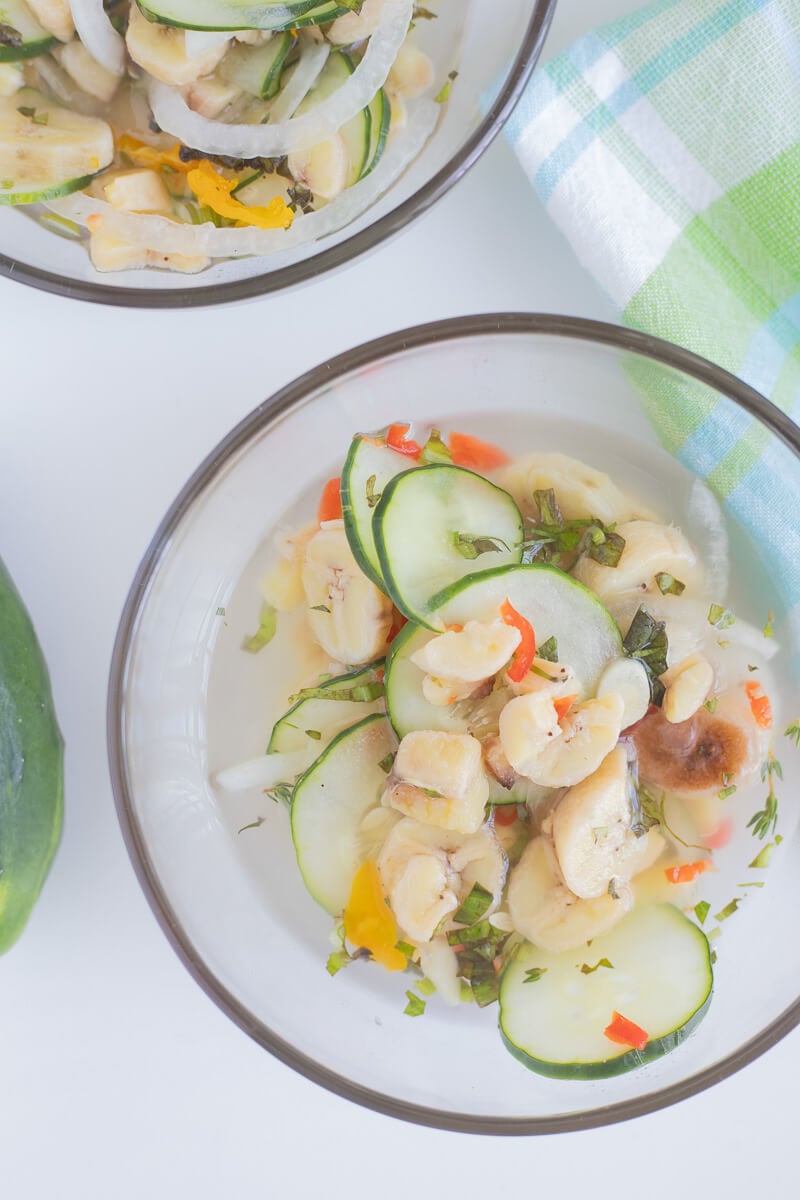 A small bowl of green fig souse with all the toppings.