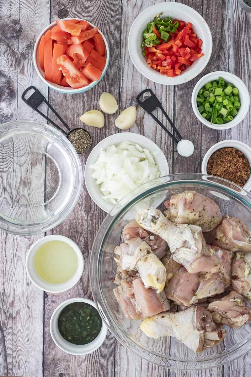 A picture of all the ingredients needed to make Trinidad stew chicken.