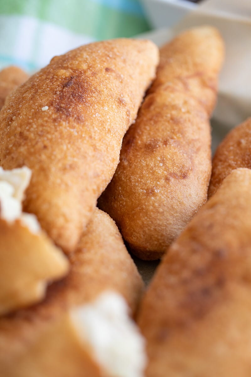 Close up image of fried Trinidad Aloo pies showing the crispy outside and the soft filling.