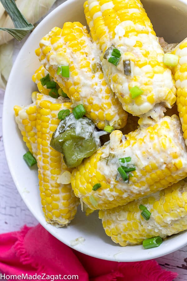 A bowl of corn on the cob already simmered and ready to serve.