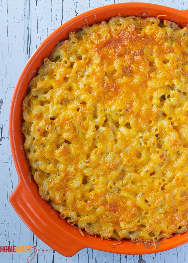 Baked macaroni pie in a casserole dish with golden cheese crust.