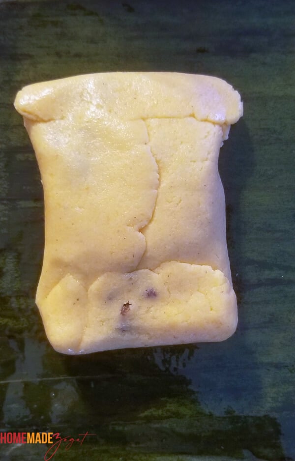 Fully folded pastelle on a banana leaf
