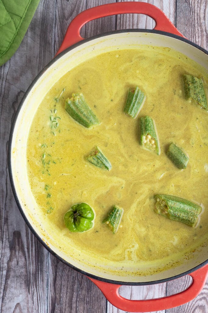 A dish of coconut milk curry sauce about to be simmered.