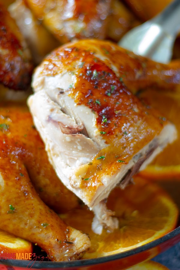 Close up of a leg quarter of the orange ginger chicken
